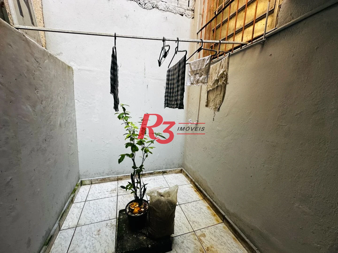 Loja, 70 m² - venda por R$ 420.000,00 ou aluguel por R$ 3.100,00/mês - Centro - Santos/SP