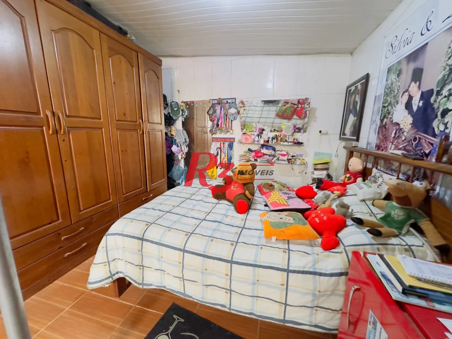 Casa à venda, 153 m² por R$ 470.000,00 - Areia Branca - Santos/SP