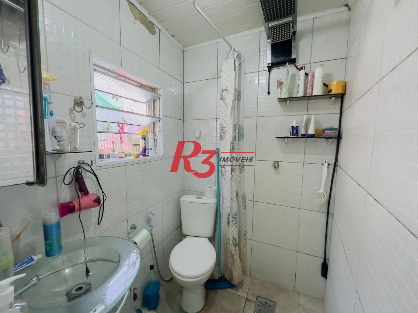 Casa à venda, 153 m² por R$ 470.000,00 - Areia Branca - Santos/SP