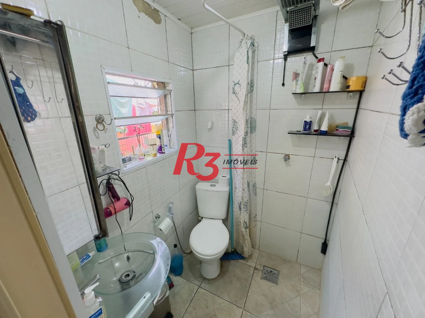 Casa à venda, 153 m² por R$ 470.000,00 - Areia Branca - Santos/SP