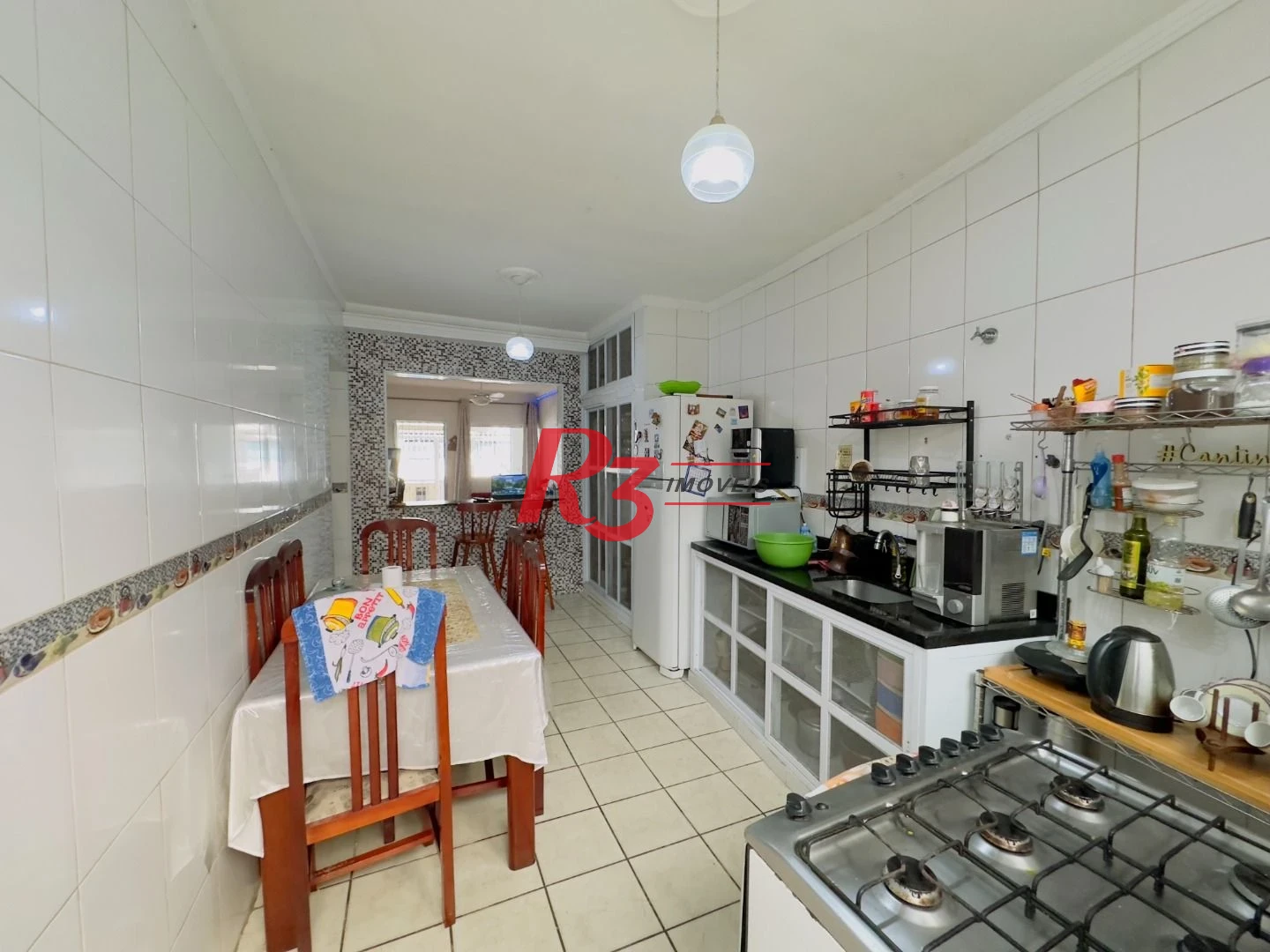 Casa à venda, 153 m² por R$ 470.000,00 - Areia Branca - Santos/SP