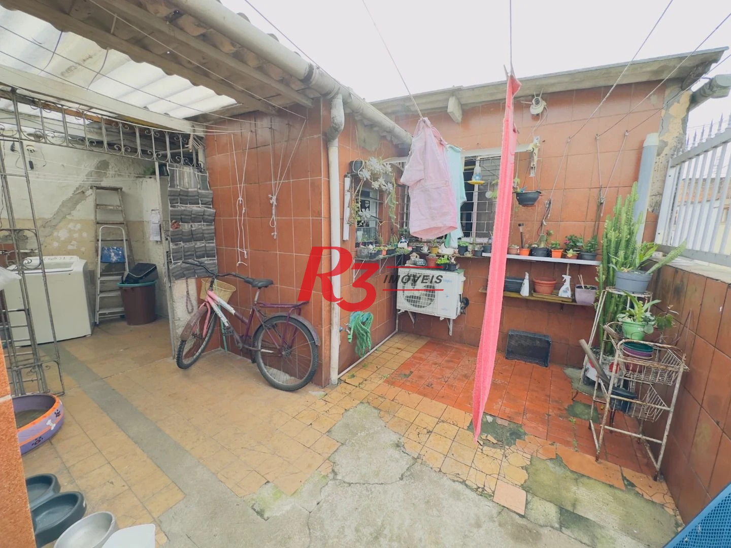 Casa à venda, 153 m² por R$ 470.000,00 - Areia Branca - Santos/SP