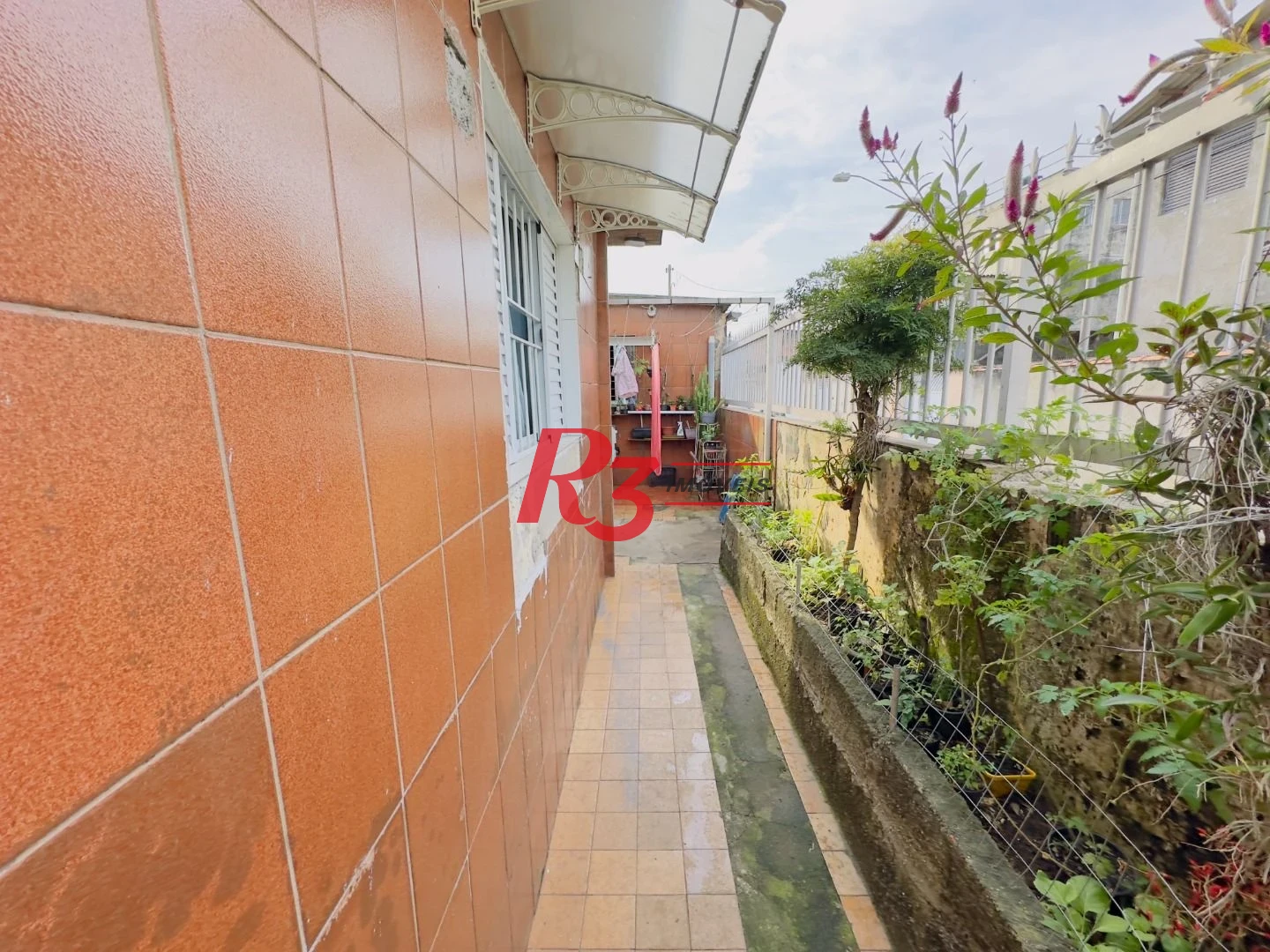 Casa à venda, 153 m² por R$ 470.000,00 - Areia Branca - Santos/SP