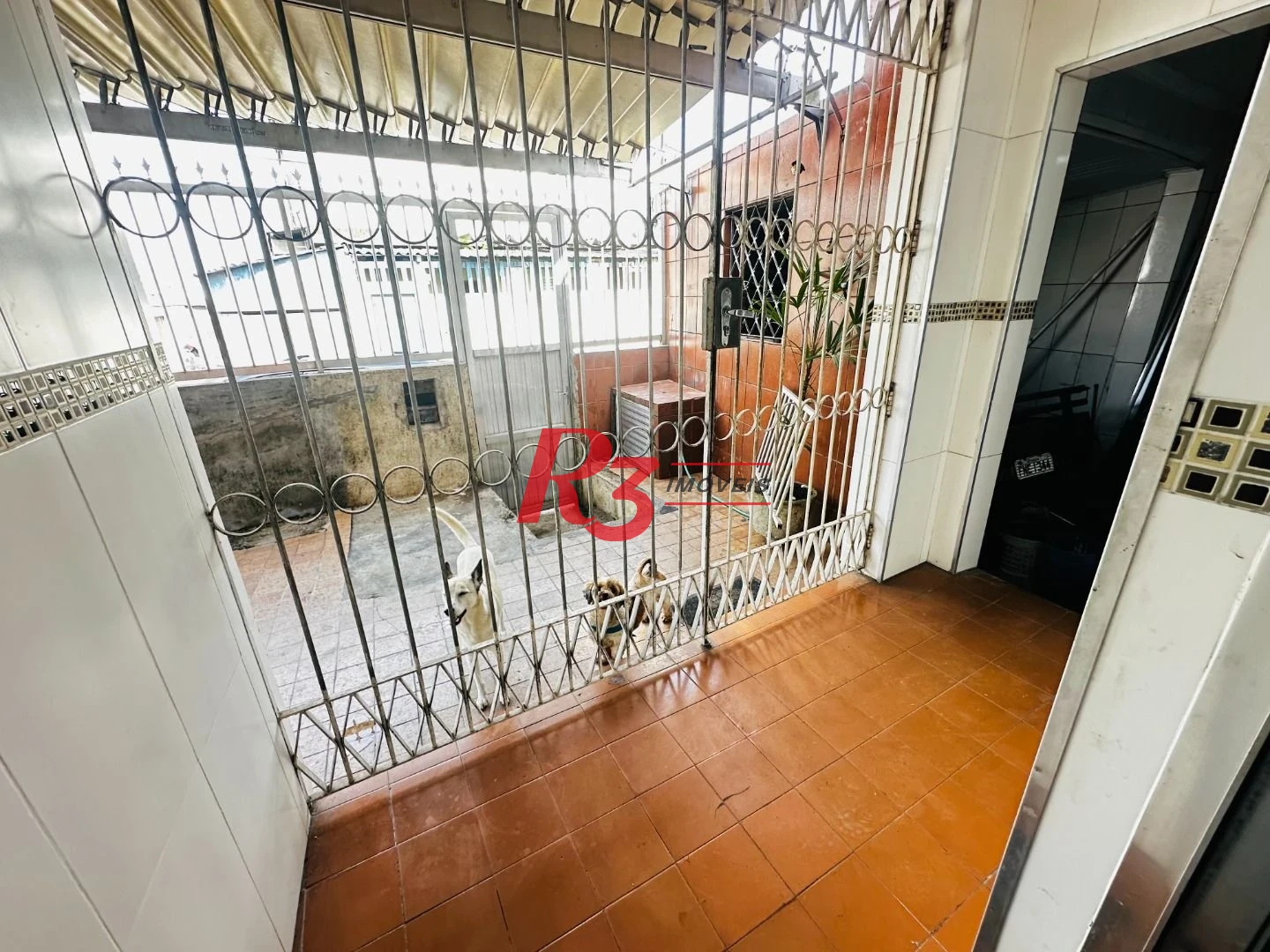 Casa à venda, 153 m² por R$ 470.000,00 - Areia Branca - Santos/SP