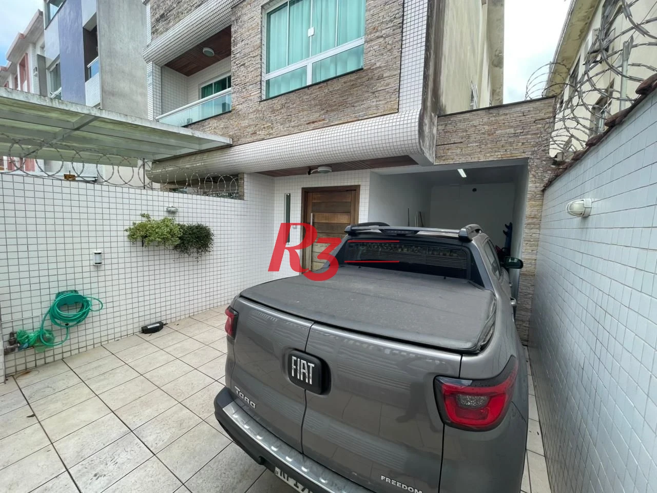 Sobrado, 334 m² - venda por R$ 2.350.000,00 ou aluguel por R$ 18.000,00/mês - Boqueirão - Santos/SP