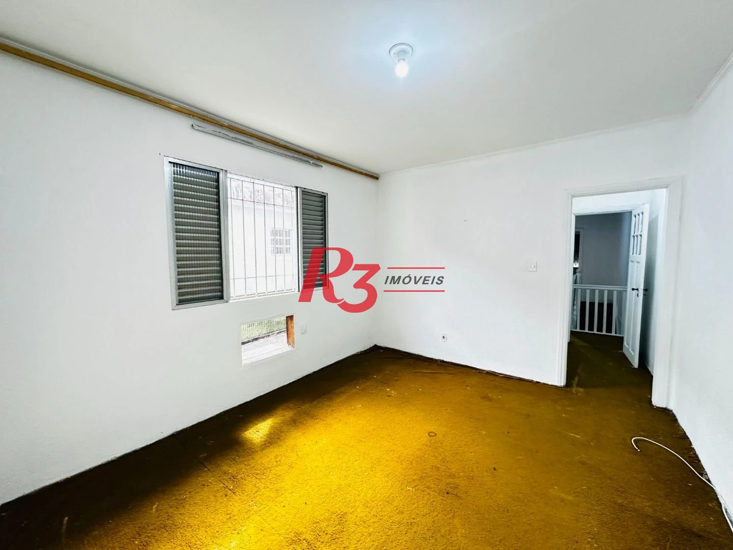 Sobrado com 3 dormitórios à venda, 248 m² por R$ 1.200.000,00 - Vila Belmiro - Santos/SP