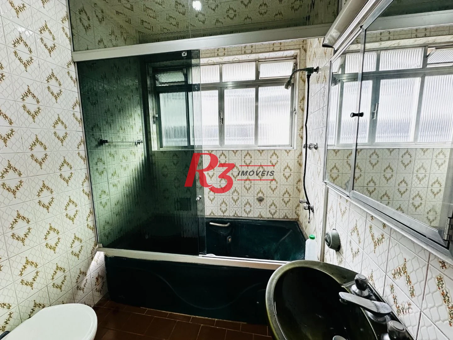 Sobrado com 3 dormitórios à venda, 248 m² por R$ 1.200.000,00 - Vila Belmiro - Santos/SP