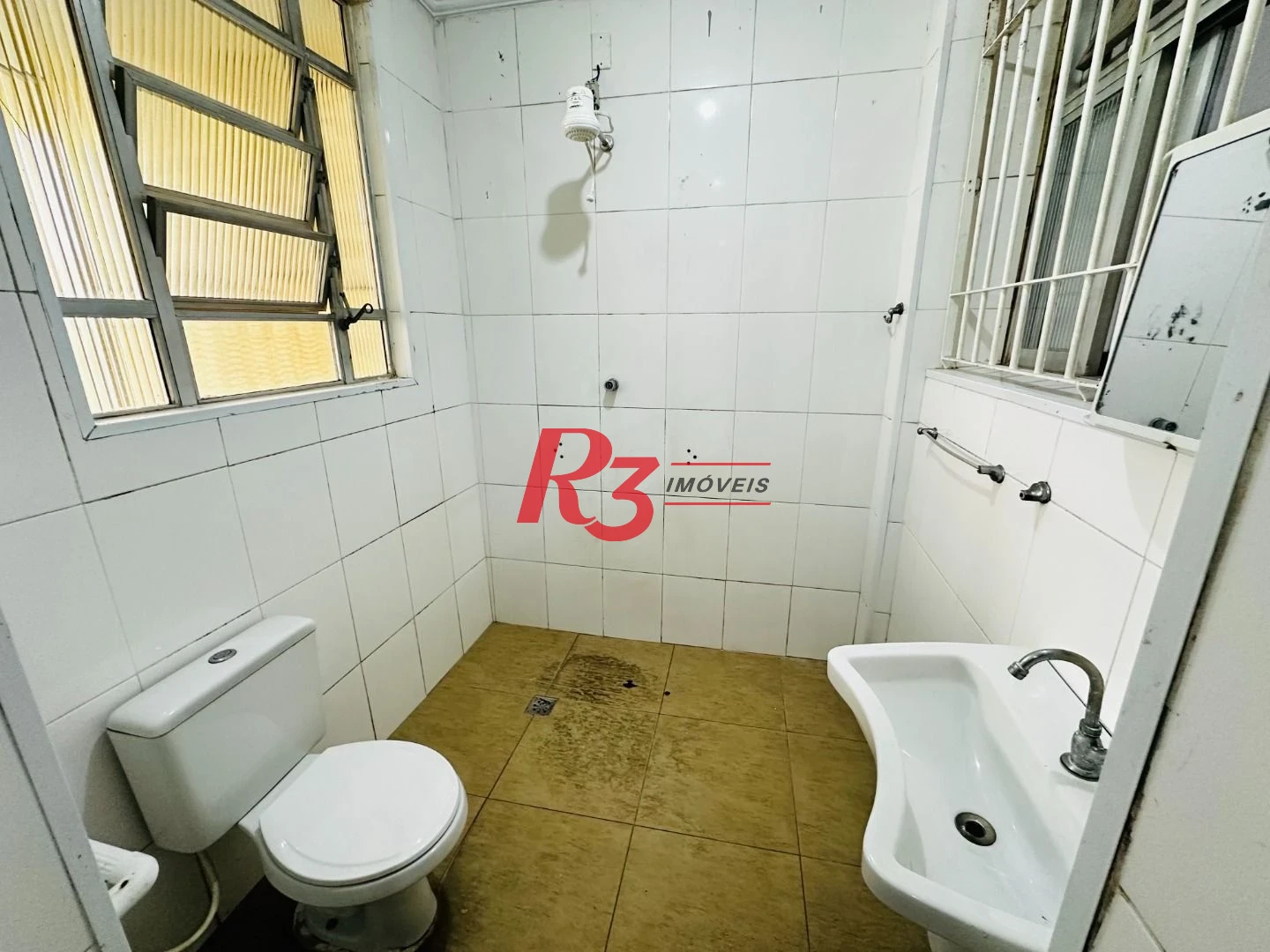 Sobrado com 3 dormitórios à venda, 248 m² por R$ 1.200.000,00 - Vila Belmiro - Santos/SP