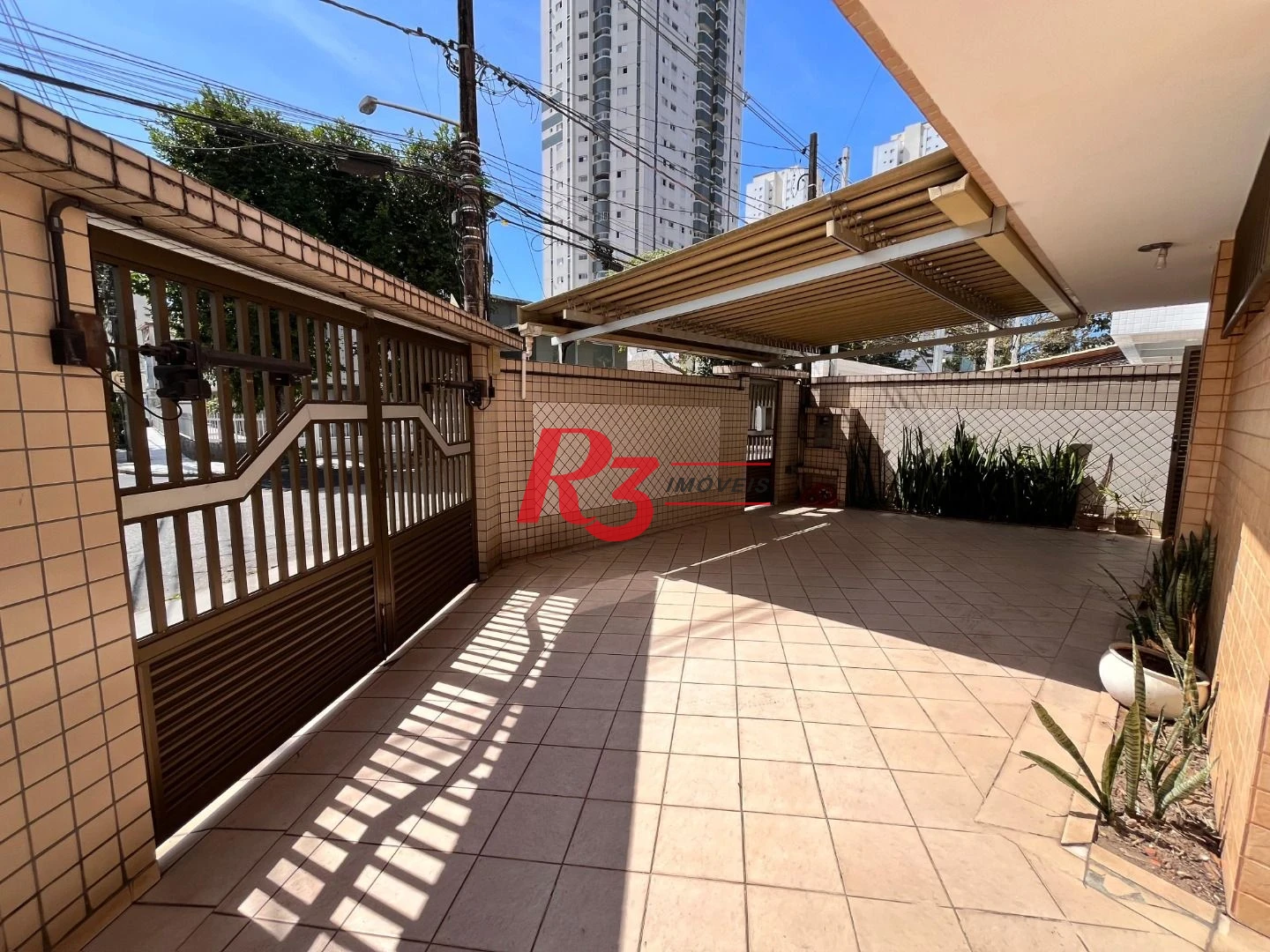 Casa com 3 dormitórios à venda, 225 m² por R$ 2.100.000,00 - Ponta da Praia - Santos/SP
