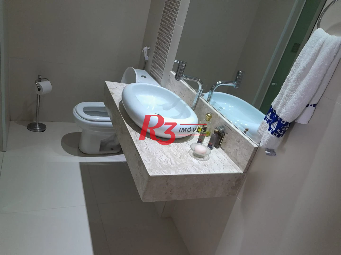 Apartamento com 4 dormitórios à venda, 376 m² por R$ 1.500.000,00 - Praia das Pitangueiras Beira Mar - Guarujá/SP