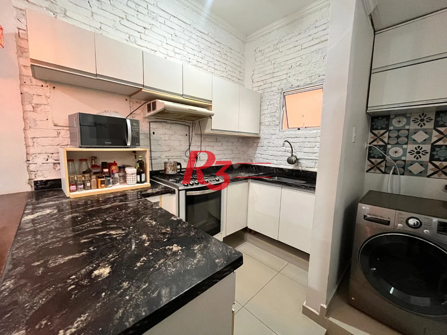 Apartamento com 2 dormitórios à venda, 87 m² por R$ 440.000,00 - Gonzaga - Santos/SP