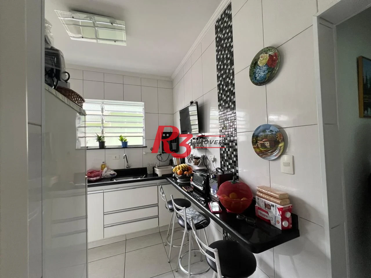 Casa com 2 dormitórios à venda, 78 m² por R$ 580.000,00 - Aparecida - Santos/SP