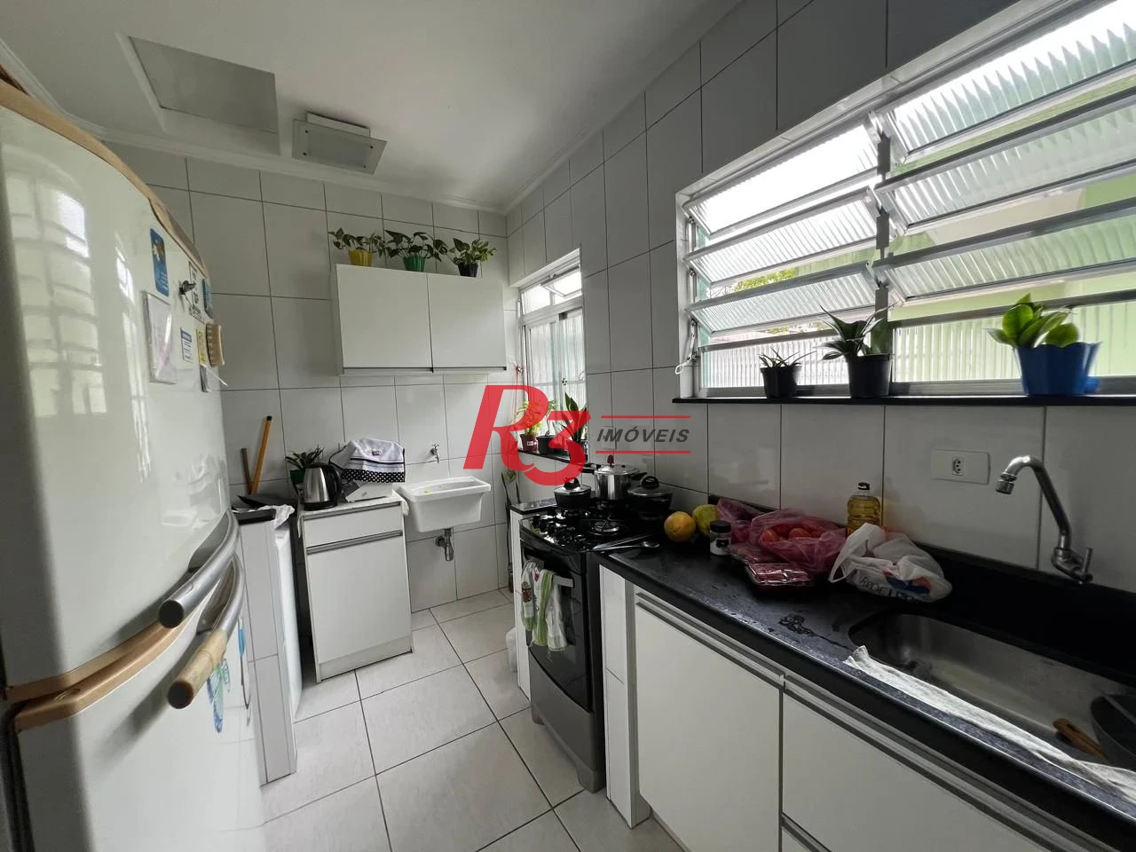 Casa com 2 dormitórios à venda, 78 m² por R$ 580.000,00 - Aparecida - Santos/SP