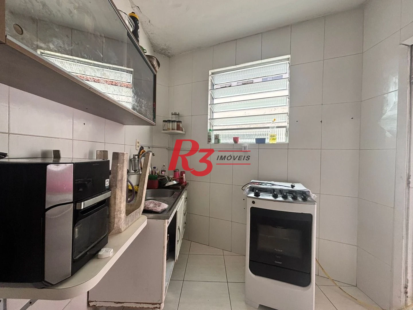 Apartamento com 2 dormitórios à venda, 65 m² por R$ 350.000,00 - Boqueirão - Santos/SP
