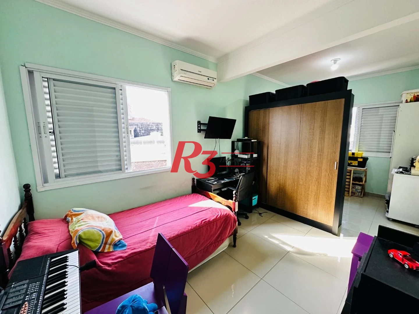 Casa com 3 dormitórios à venda, 210 m² por R$ 650.000,00 - Centro - São Vicente/SP