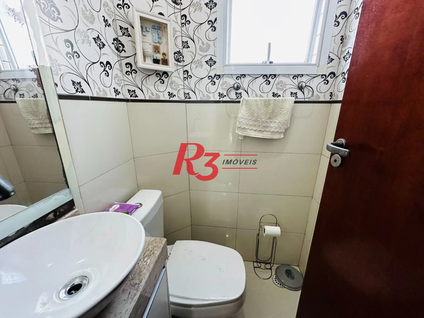 Casa com 3 dormitórios à venda, 210 m² por R$ 650.000,00 - Centro - São Vicente/SP
