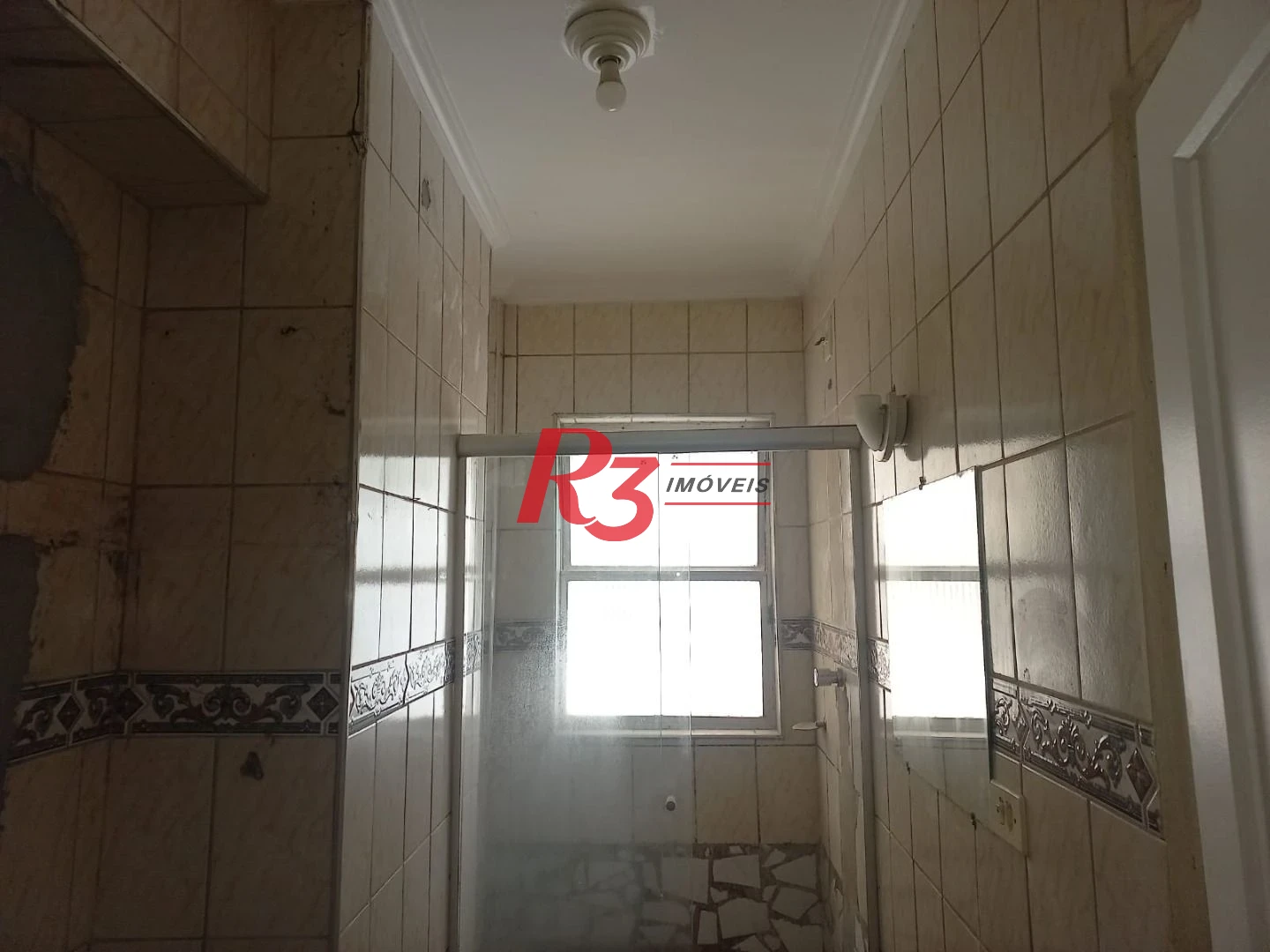 Apartamento com 2 dormitórios à venda, 53 m² por R$ 345.000,00 - Embaré - Santos/SP