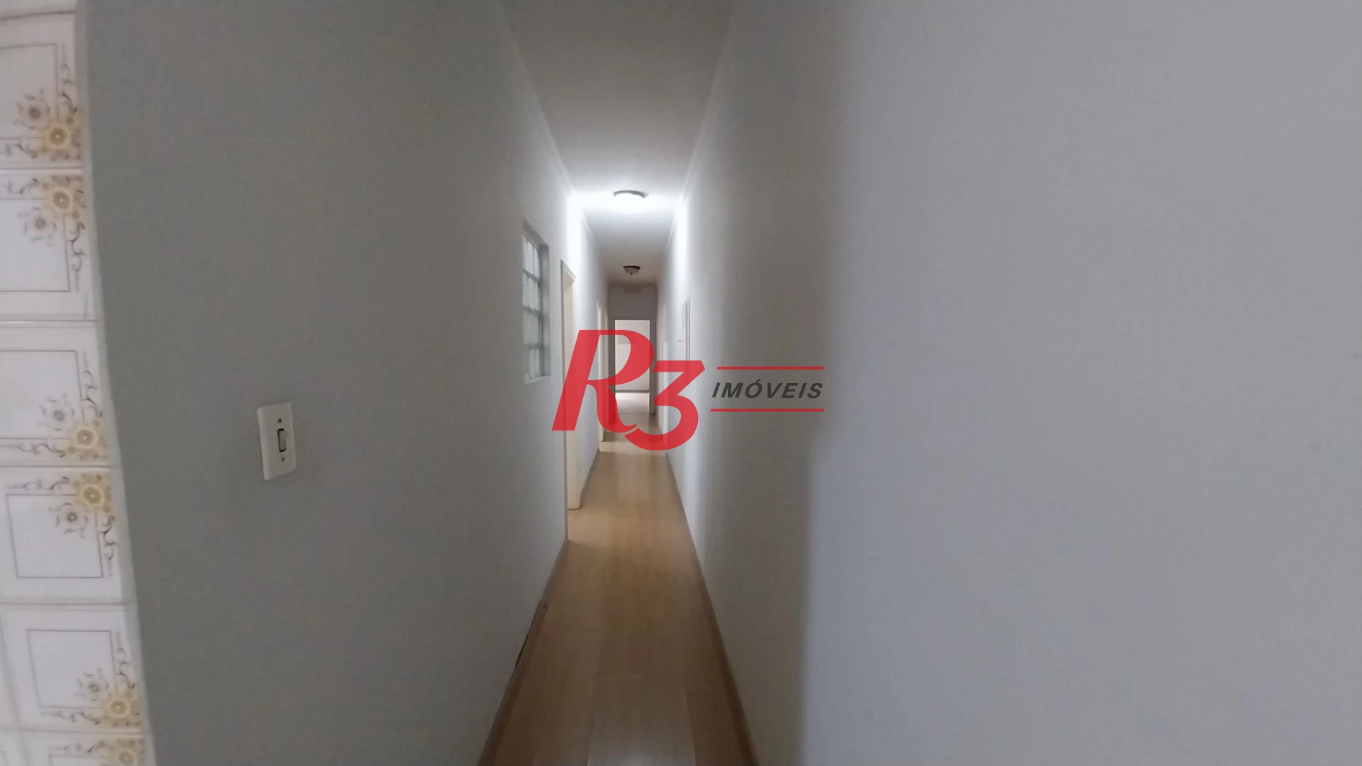 Casa com 3 dormitórios à venda, 142 m² por R$ 700.000,00 - Encruzilhada - Santos/SP