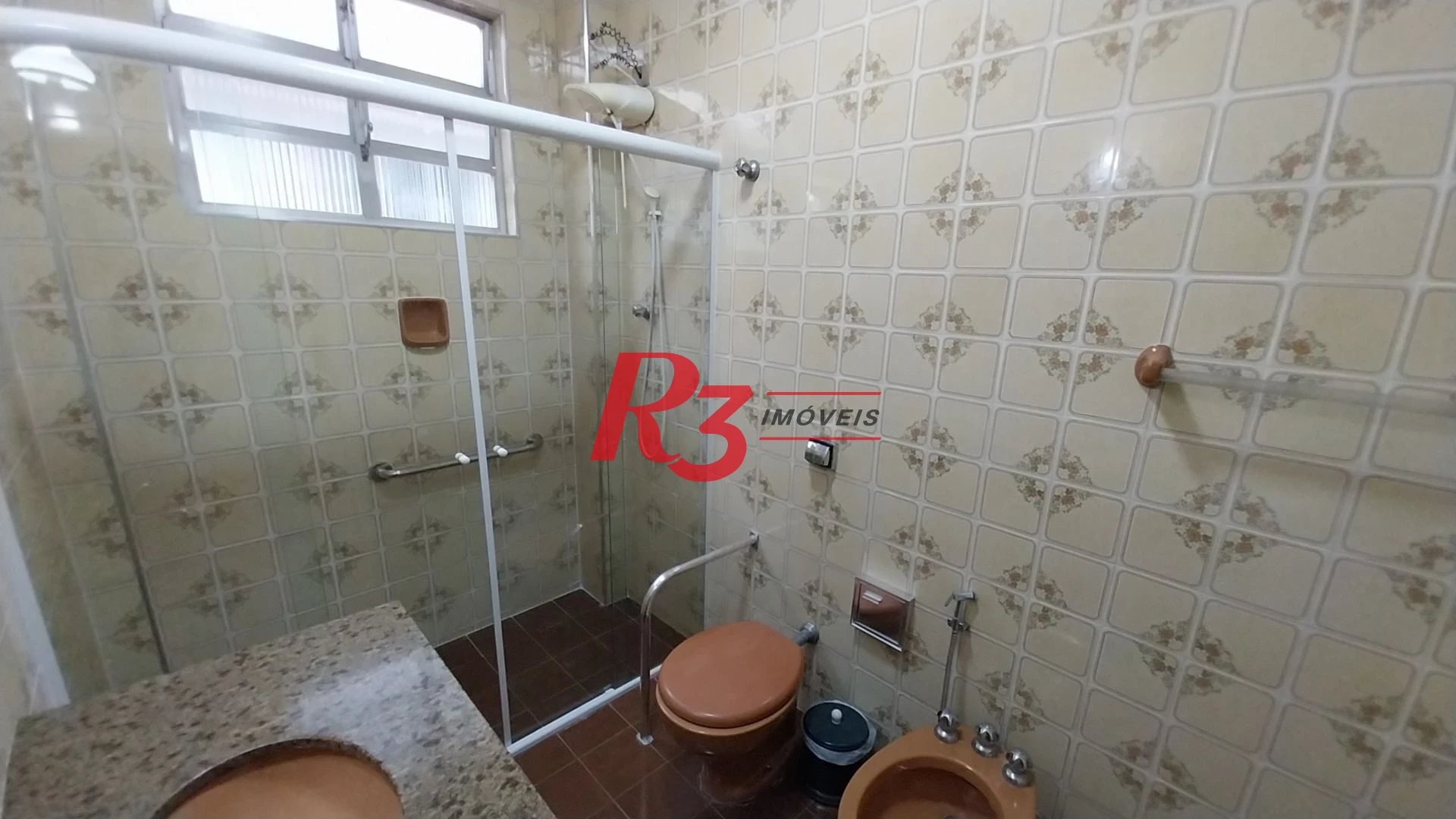Casa com 3 dormitórios à venda, 142 m² por R$ 700.000,00 - Encruzilhada - Santos/SP
