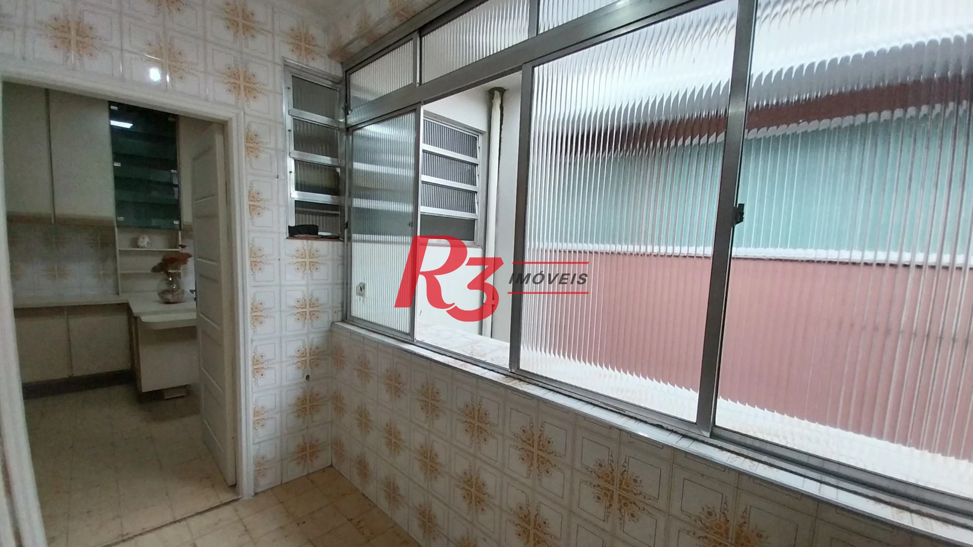 Casa com 3 dormitórios à venda, 142 m² por R$ 700.000,00 - Encruzilhada - Santos/SP