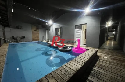 Casa com 4 dormitórios à venda, 139 m² por R$ 670.000,00 - Jardim Virginia - Guarujá/SP