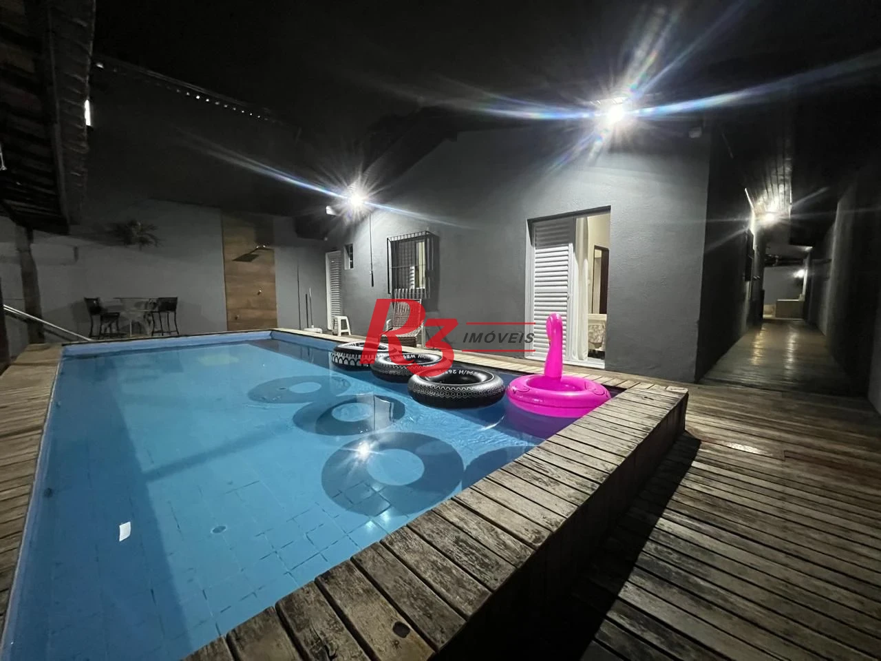 Casa com 4 dormitórios à venda, 139 m² por R$ 670.000,00 - Jardim Virginia - Guarujá/SP