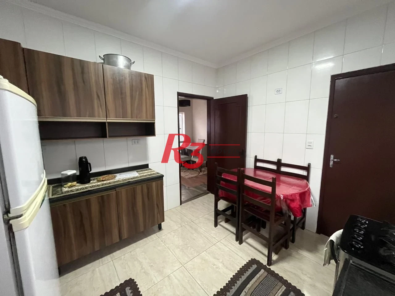 Casa com 4 dormitórios à venda, 139 m² por R$ 670.000,00 - Jardim Virginia - Guarujá/SP