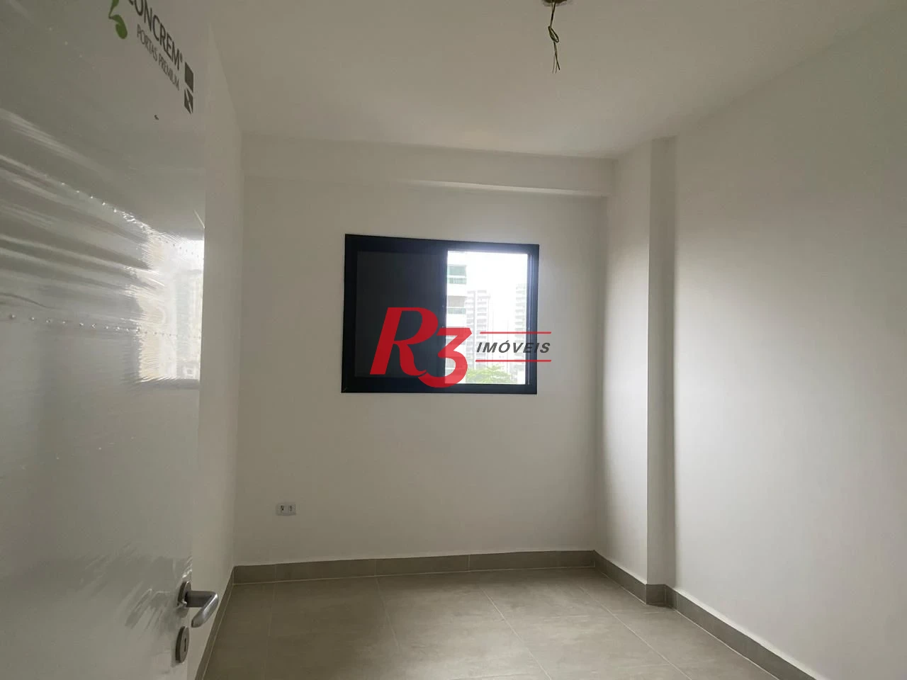 Apartamento com 2 dormitórios à venda, 71 m² por R$ 500.000,00 - Vila Guilhermina - Praia Grande/SP
