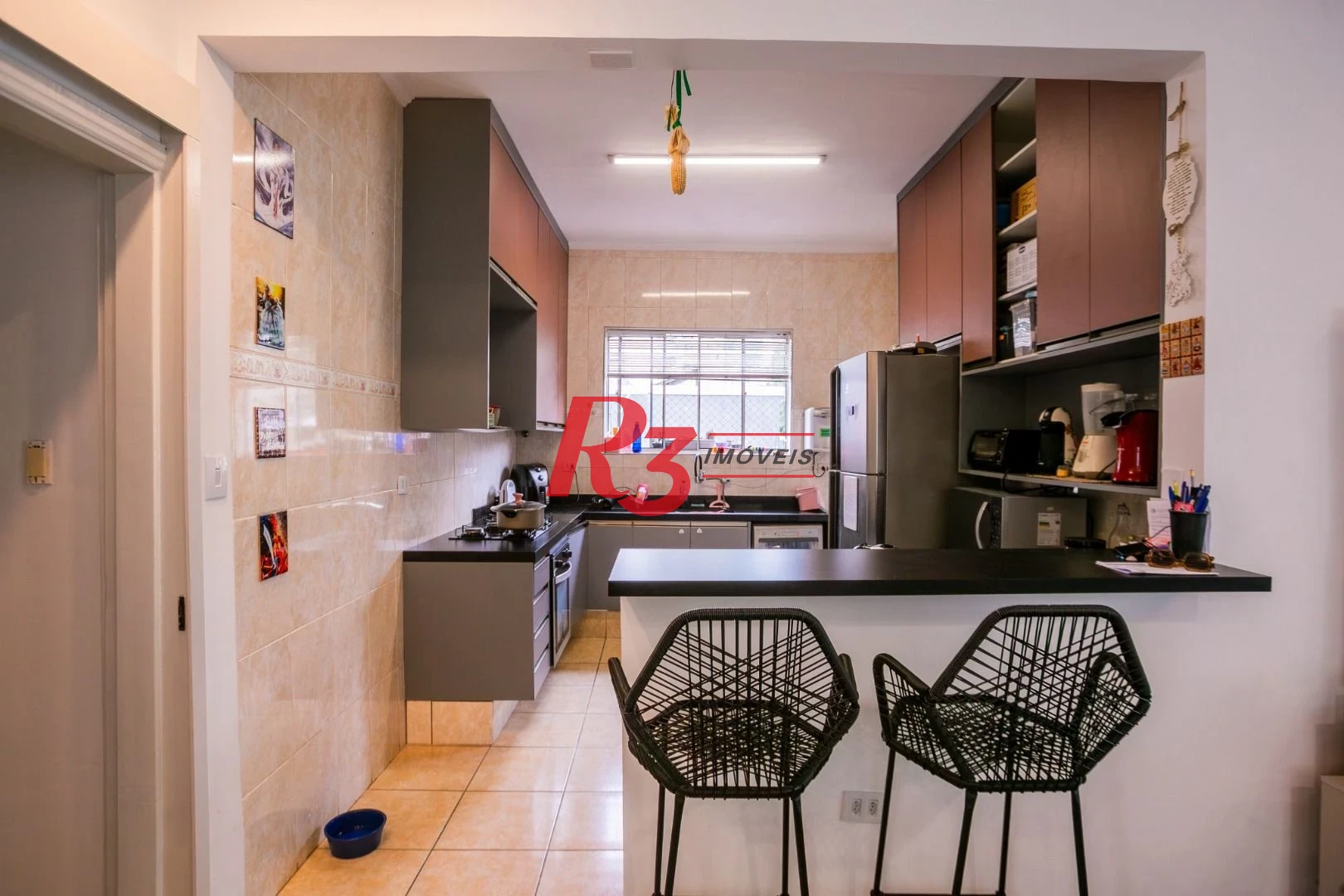 Casa com 3 dormitórios à venda, 320 m² por R$ 1.790.000,00 - Gonzaga - Santos/SP