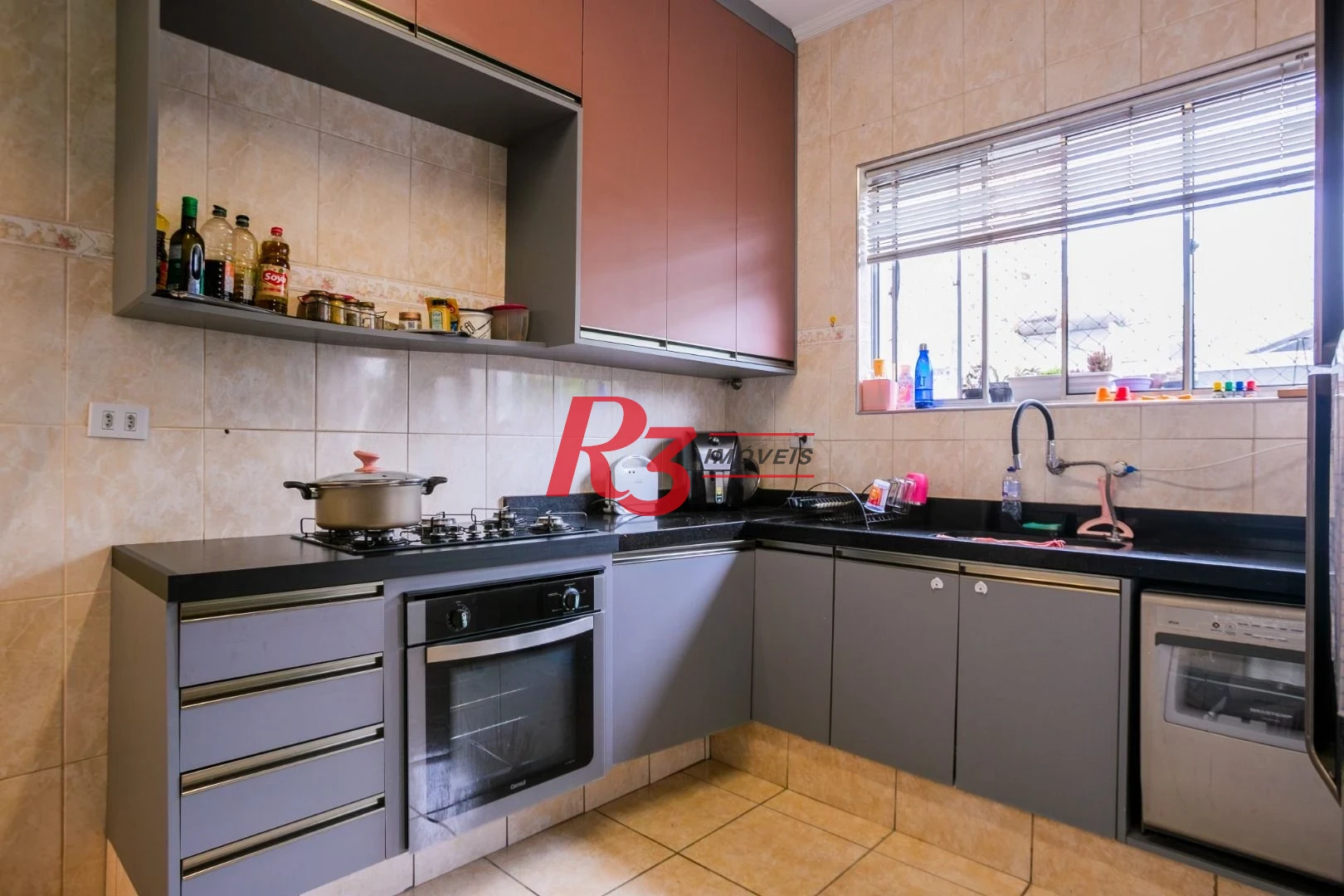 Casa com 3 dormitórios à venda, 320 m² por R$ 1.790.000,00 - Gonzaga - Santos/SP