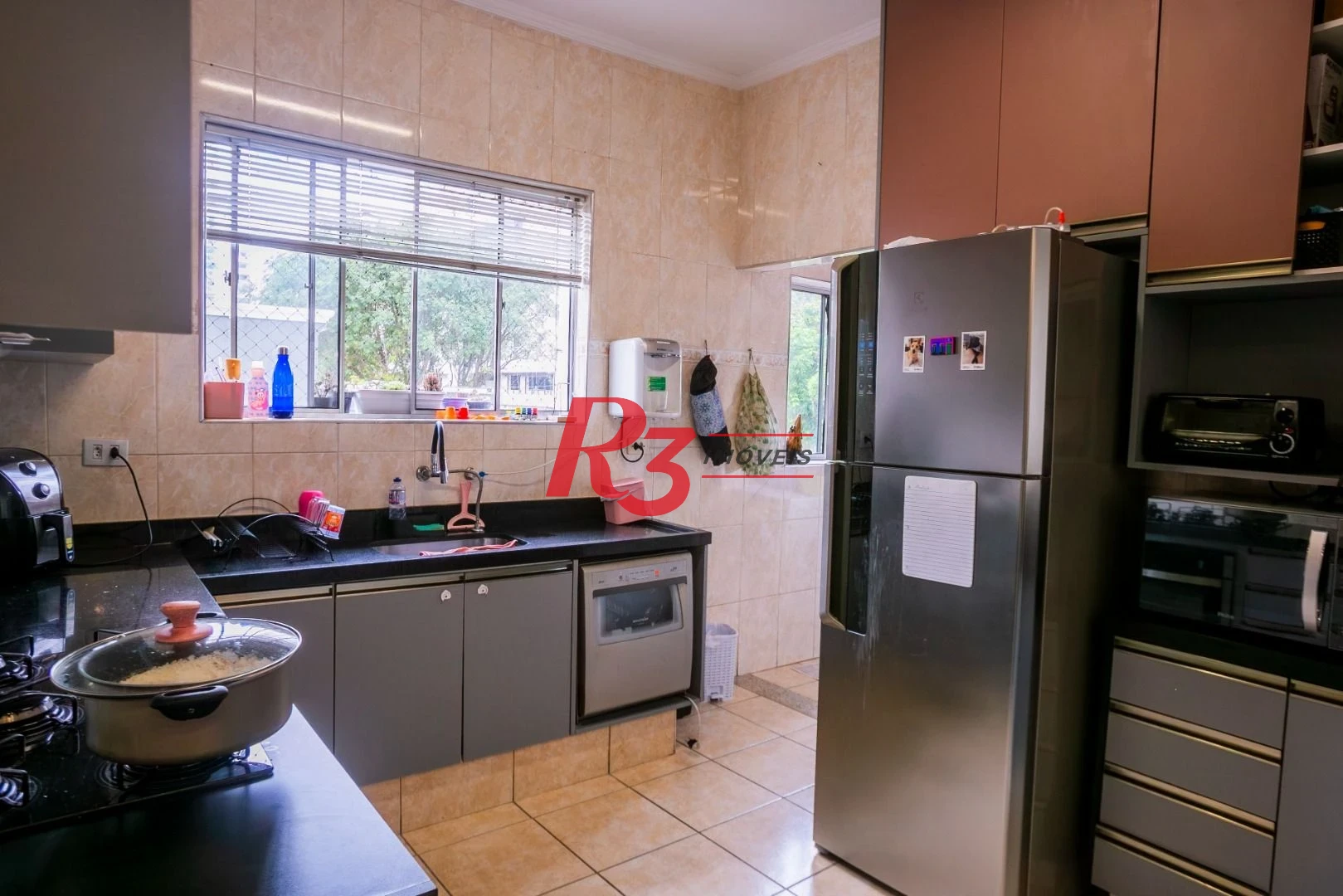Casa com 3 dormitórios à venda, 320 m² por R$ 1.790.000,00 - Gonzaga - Santos/SP