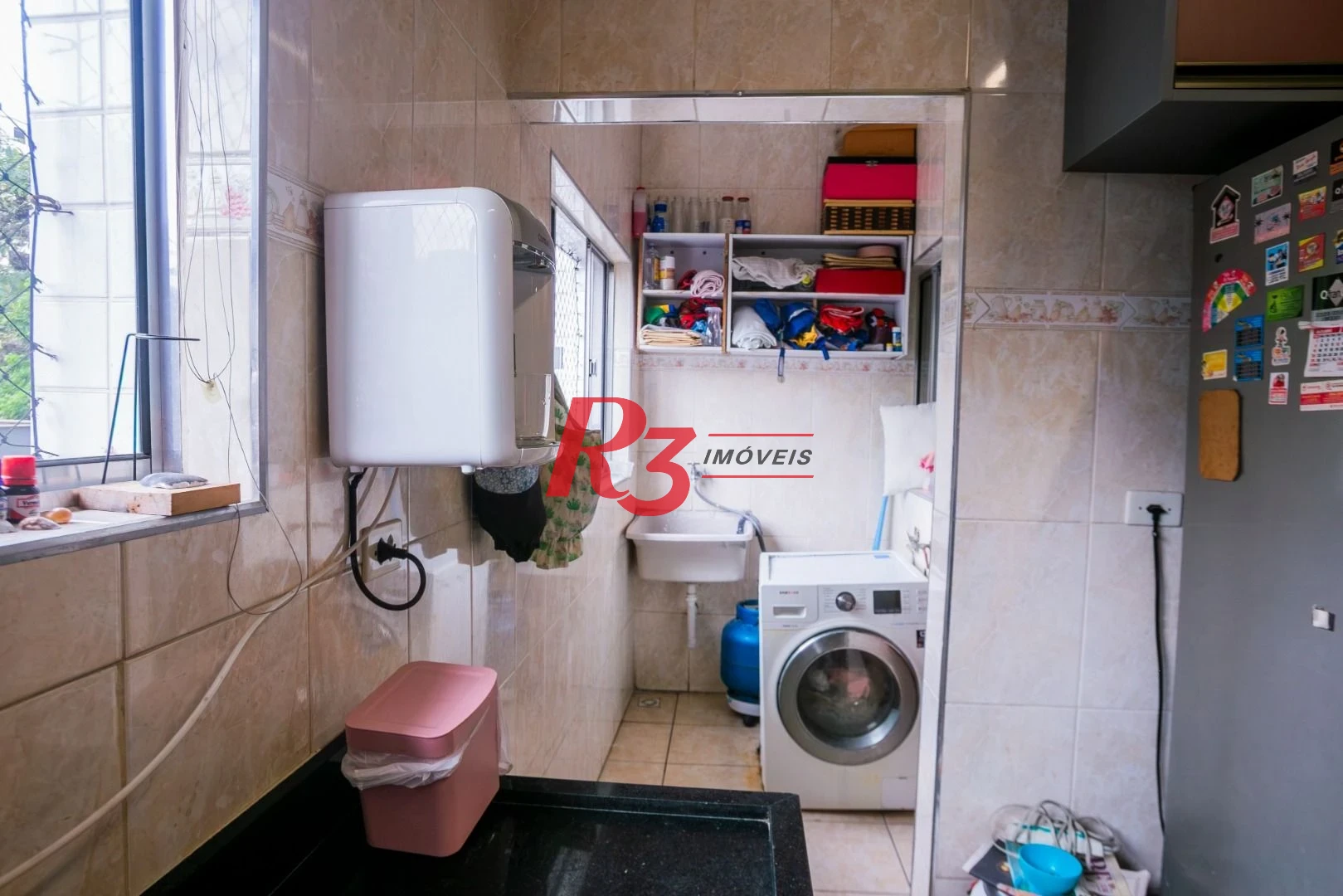 Casa com 3 dormitórios à venda, 320 m² por R$ 1.790.000,00 - Gonzaga - Santos/SP