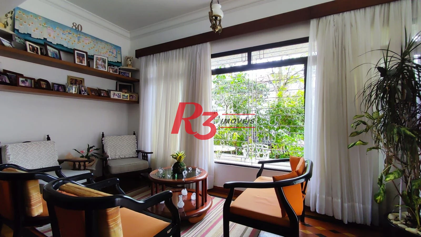 Sobrado com 4 dormitórios à venda, 222 m² por R$ 2.200.000,00 - Ponta da Praia - Santos/SP