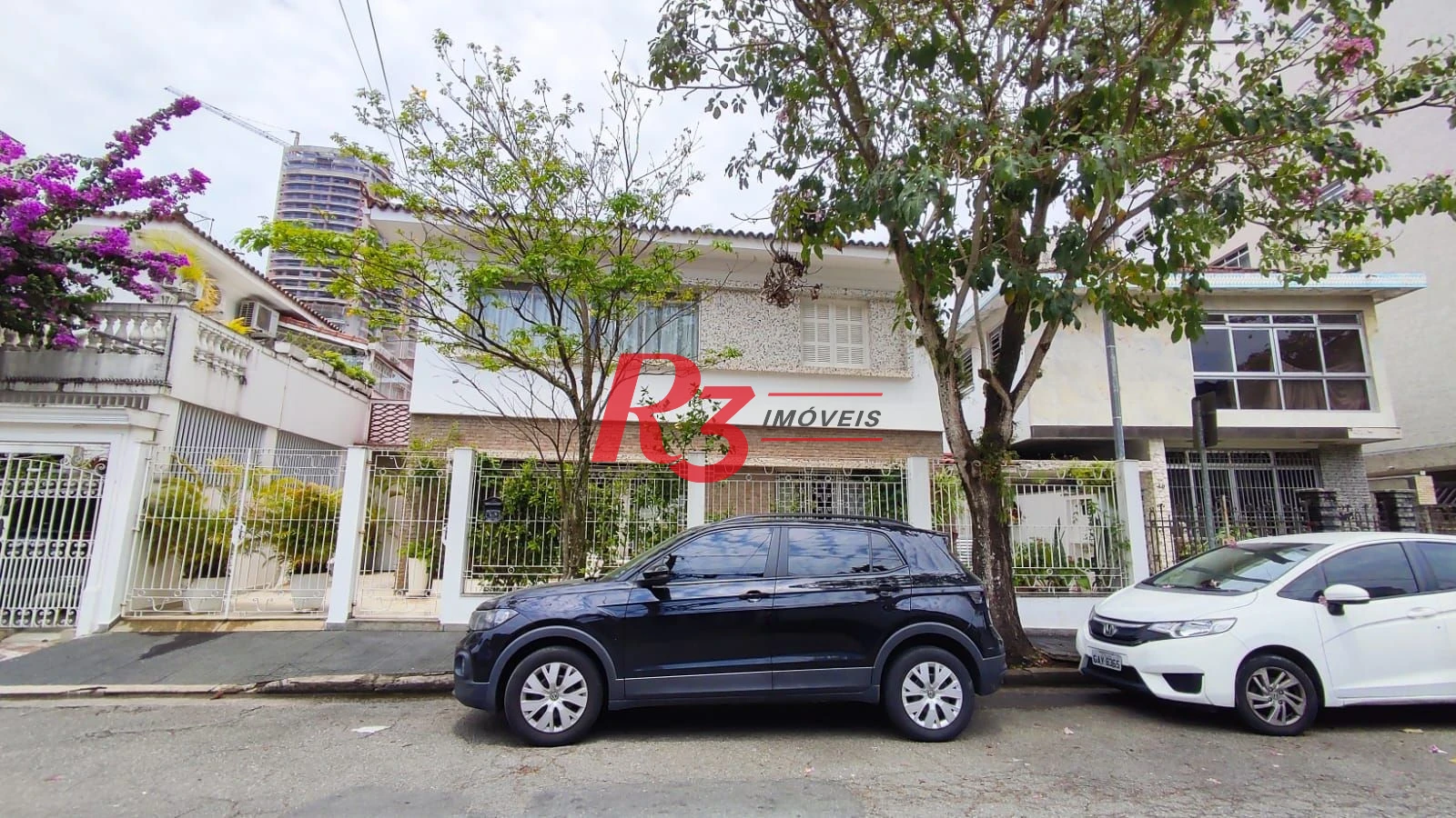 Sobrado com 4 dormitórios à venda, 222 m² por R$ 2.200.000,00 - Ponta da Praia - Santos/SP