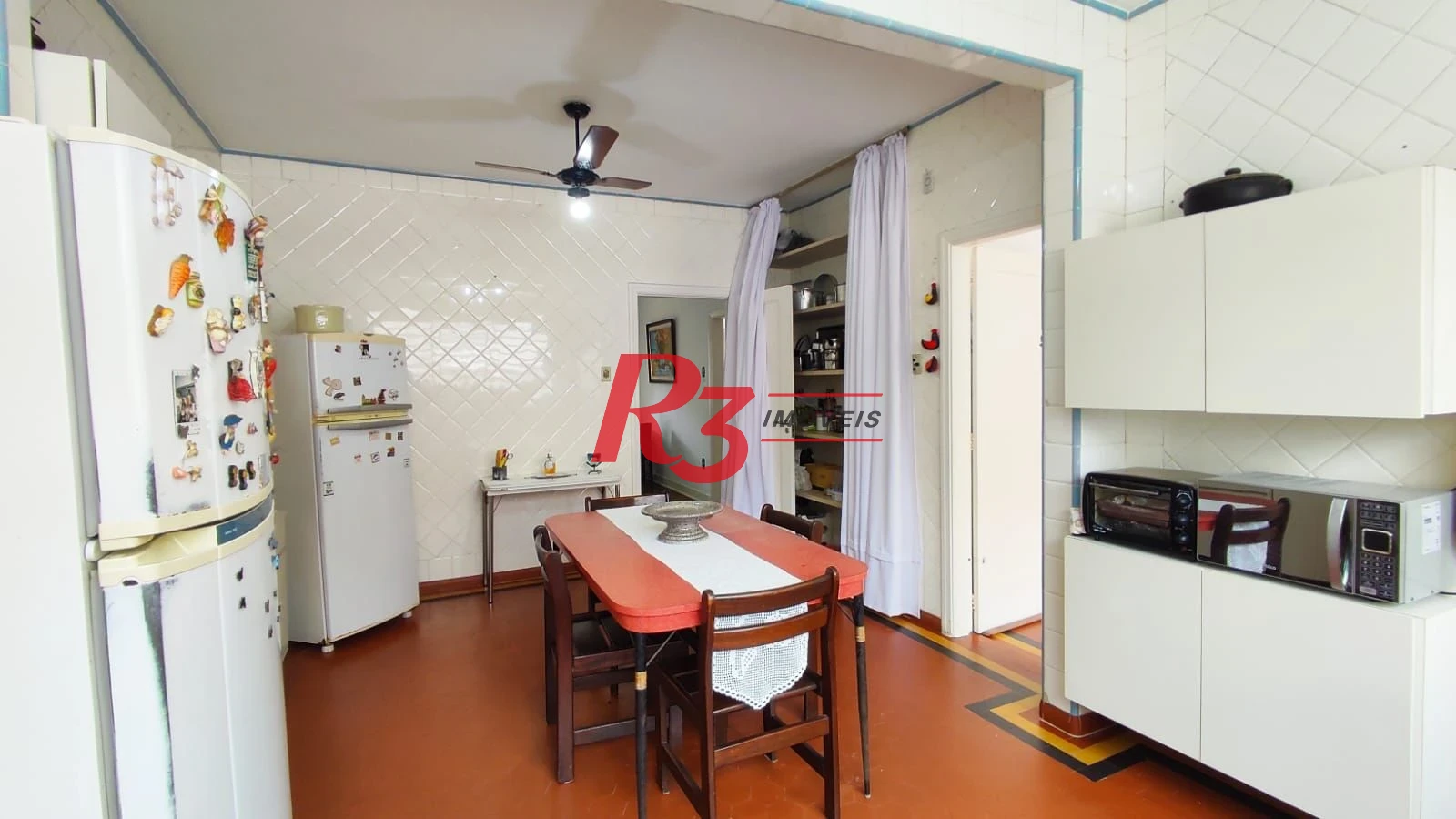 Sobrado com 4 dormitórios à venda, 222 m² por R$ 2.200.000,00 - Ponta da Praia - Santos/SP