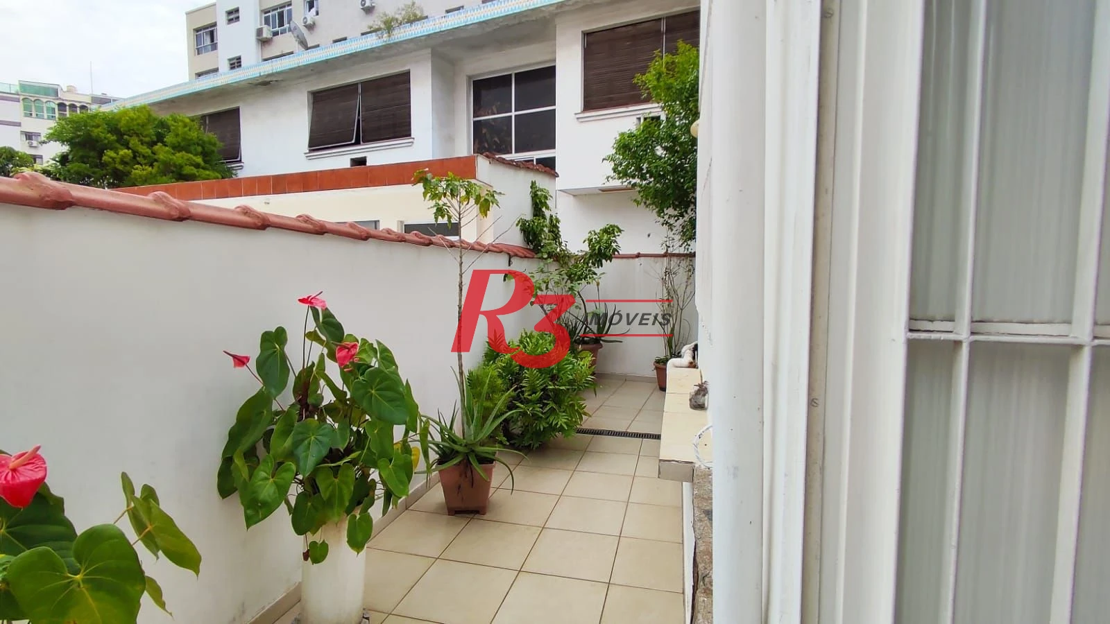 Sobrado com 4 dormitórios à venda, 222 m² por R$ 2.200.000,00 - Ponta da Praia - Santos/SP