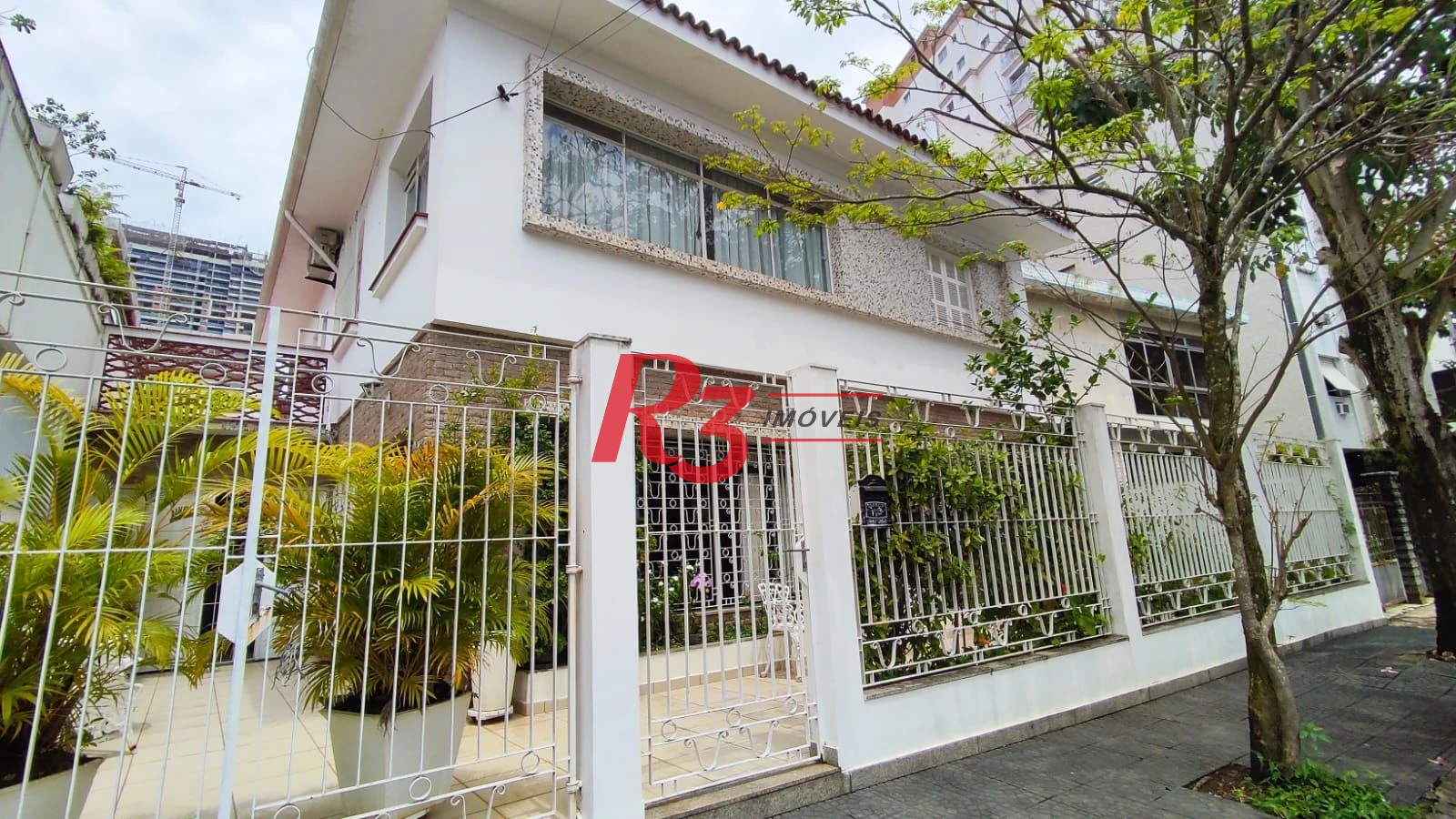 Sobrado com 4 dormitórios à venda, 222 m² por R$ 2.200.000,00 - Ponta da Praia - Santos/SP