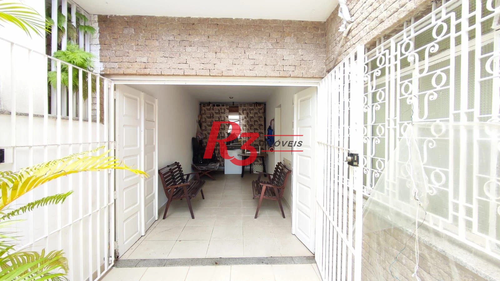Sobrado com 4 dormitórios à venda, 222 m² por R$ 2.200.000,00 - Ponta da Praia - Santos/SP