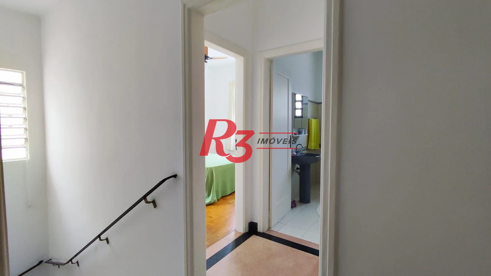 Sobrado com 4 dormitórios à venda, 222 m² por R$ 2.200.000,00 - Ponta da Praia - Santos/SP