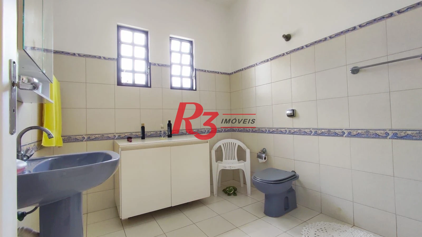 Sobrado com 4 dormitórios à venda, 222 m² por R$ 2.200.000,00 - Ponta da Praia - Santos/SP