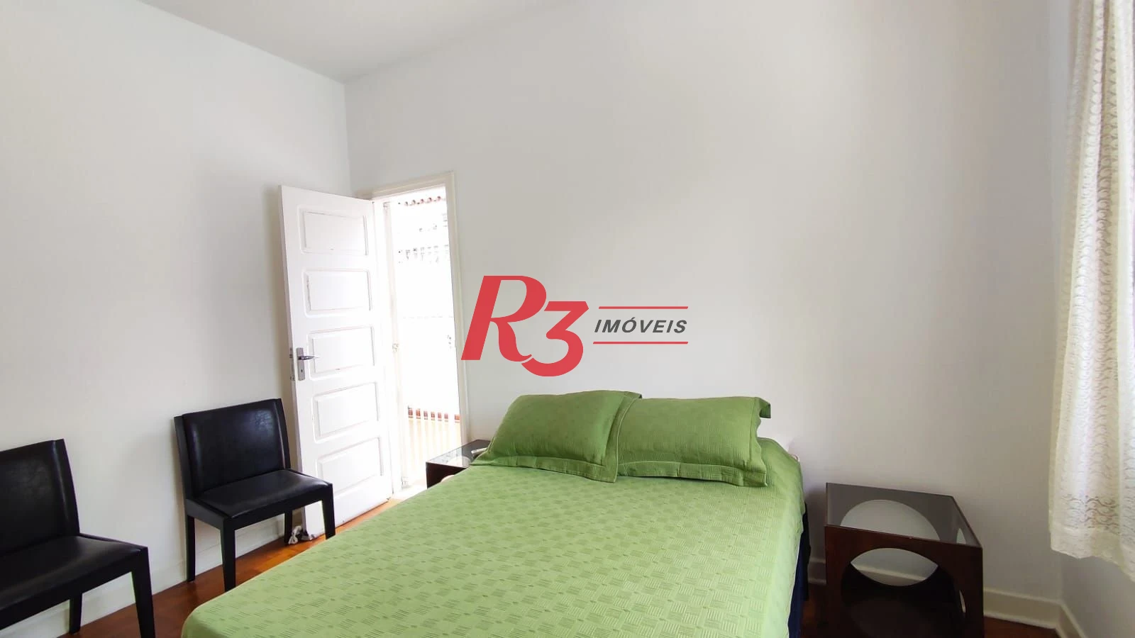 Sobrado com 4 dormitórios à venda, 222 m² por R$ 2.200.000,00 - Ponta da Praia - Santos/SP