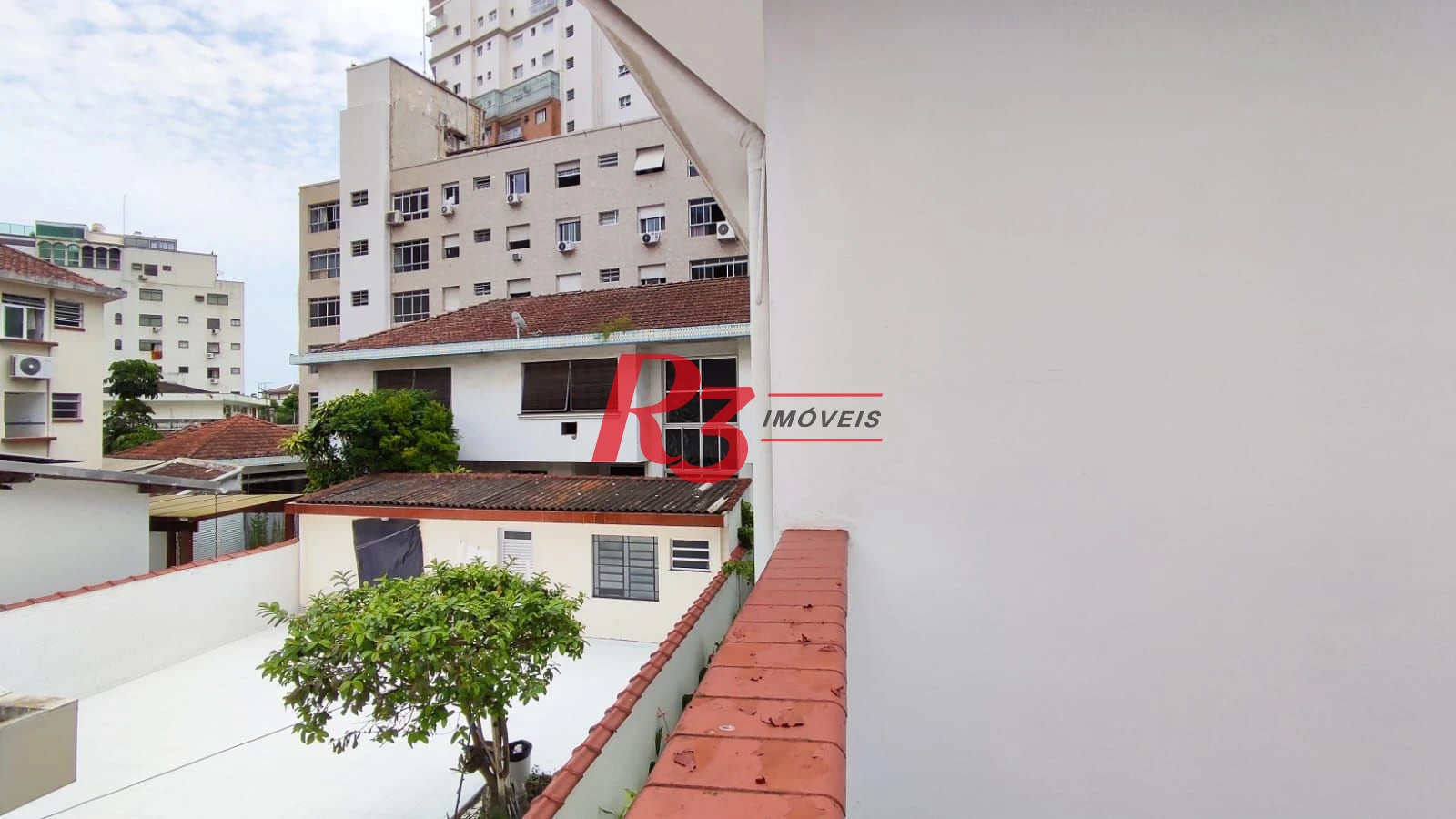 Sobrado com 4 dormitórios à venda, 222 m² por R$ 2.200.000,00 - Ponta da Praia - Santos/SP