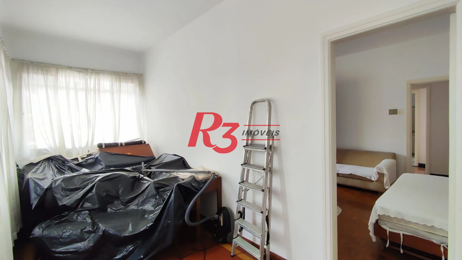 Sobrado com 4 dormitórios à venda, 222 m² por R$ 2.200.000,00 - Ponta da Praia - Santos/SP
