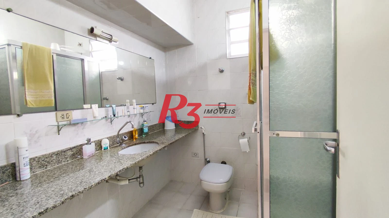 Sobrado com 4 dormitórios à venda, 222 m² por R$ 2.200.000,00 - Ponta da Praia - Santos/SP