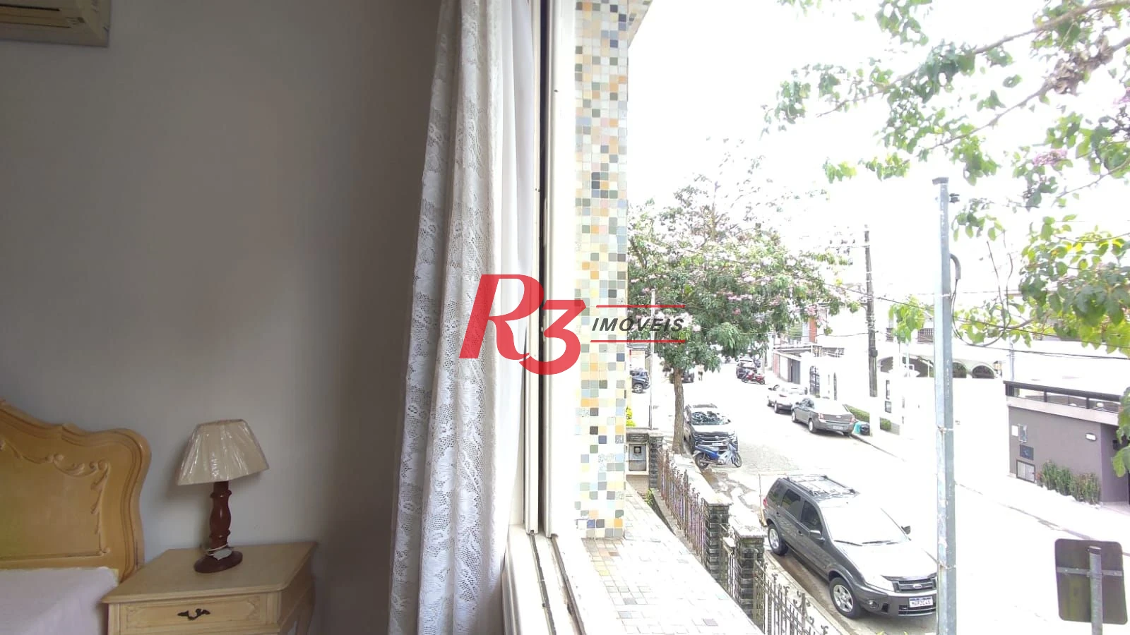 Sobrado com 4 dormitórios à venda, 222 m² por R$ 2.200.000,00 - Ponta da Praia - Santos/SP