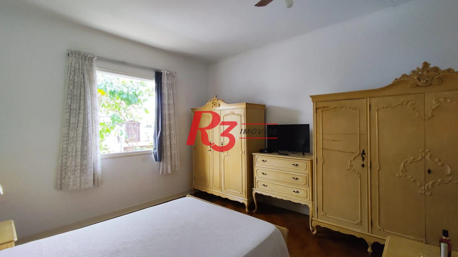 Sobrado com 4 dormitórios à venda, 222 m² por R$ 2.200.000,00 - Ponta da Praia - Santos/SP
