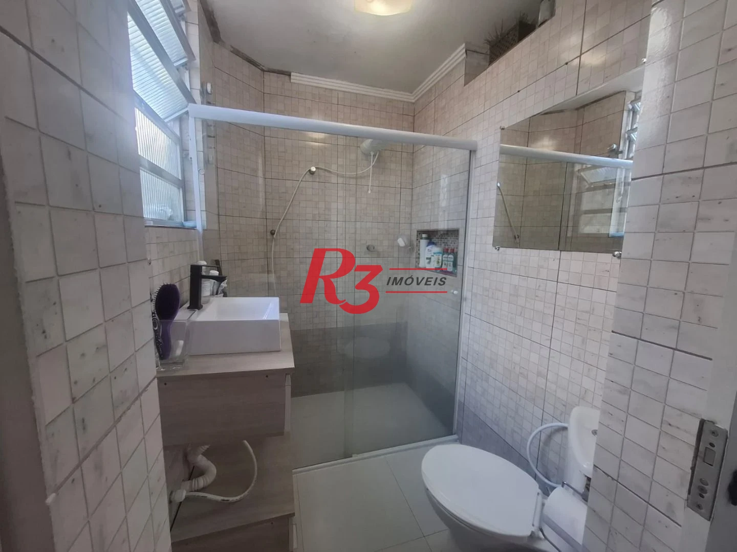 Apartamento com 2 dormitórios à venda, 75 m² por R$ 400.000,00 - Vila Mathias - Santos/SP