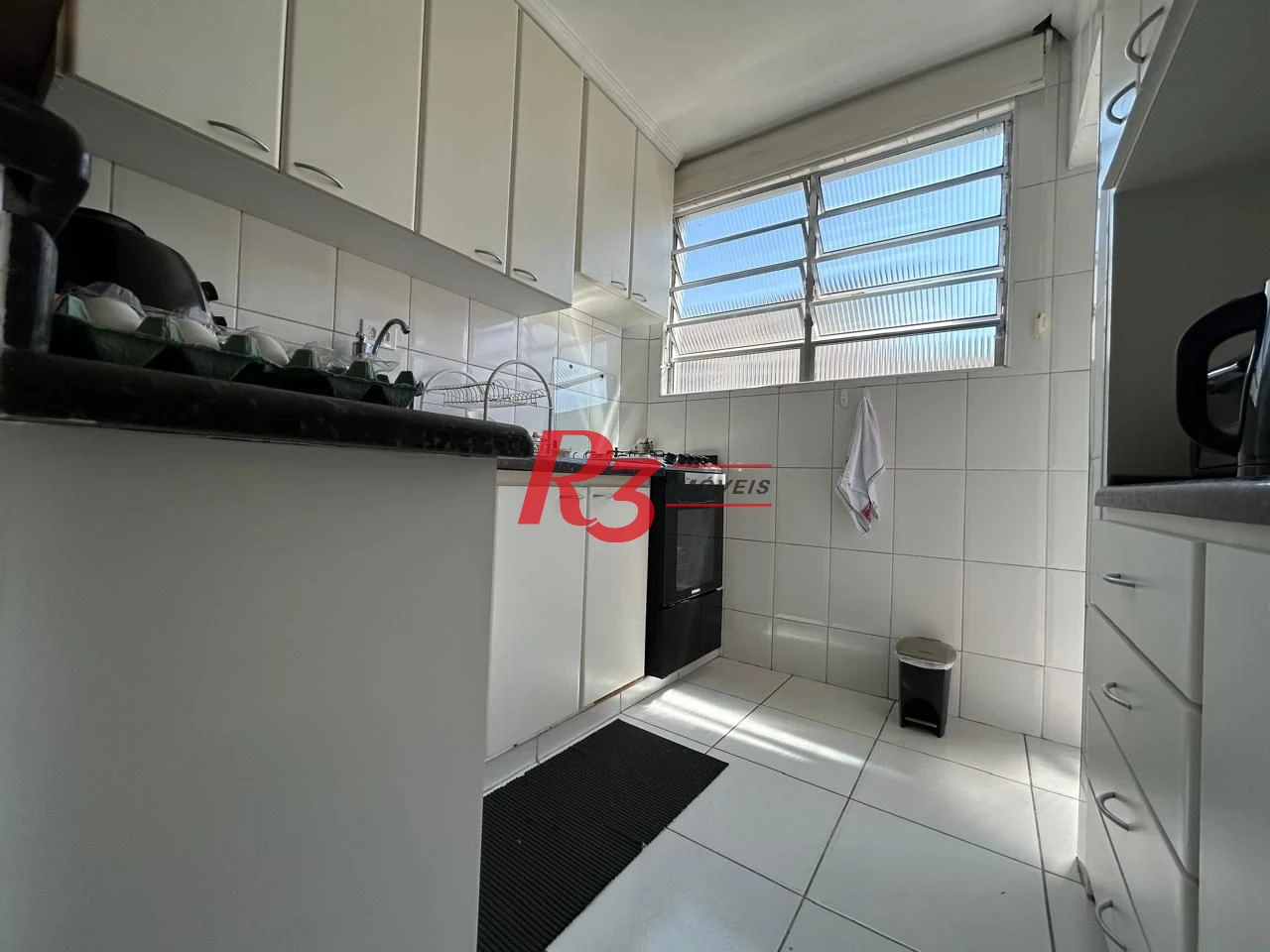 Apartamento com 2 dormitórios à venda, 57 m² por R$ 469.000,00 - Boqueirão - Santos/SP