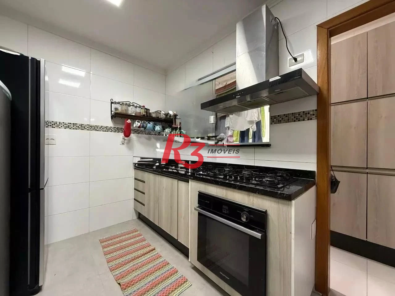 Village com 3 dormitórios à venda, 110 m² por R$ 700.000,00 - José Menino - Santos/SP