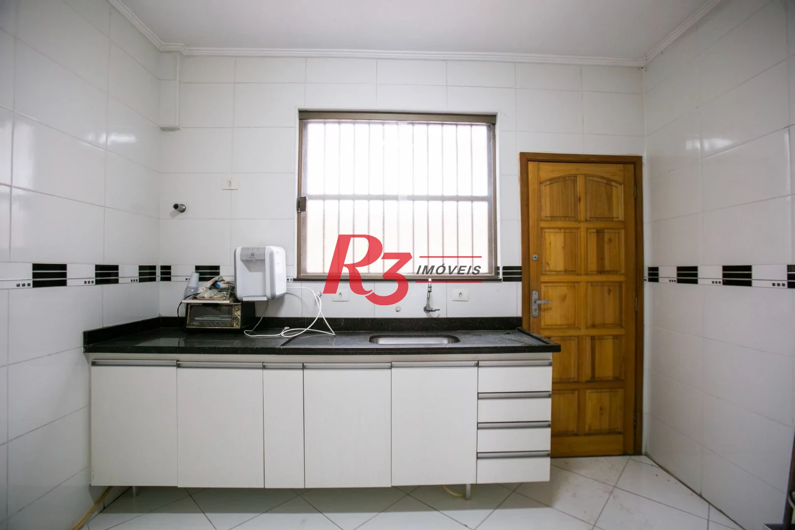Sobrado com 3 dormitórios à venda, 92 m² por R$ 800.000,00 - Ponta da Praia - Santos/SP
